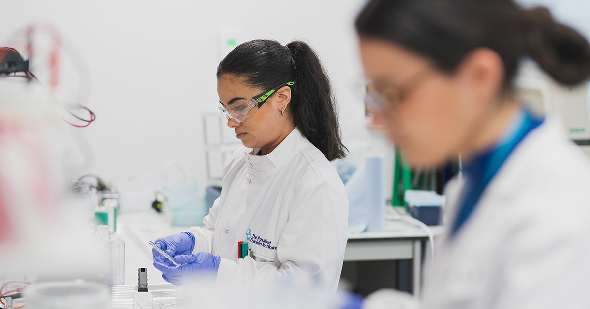 Two women working in a lab