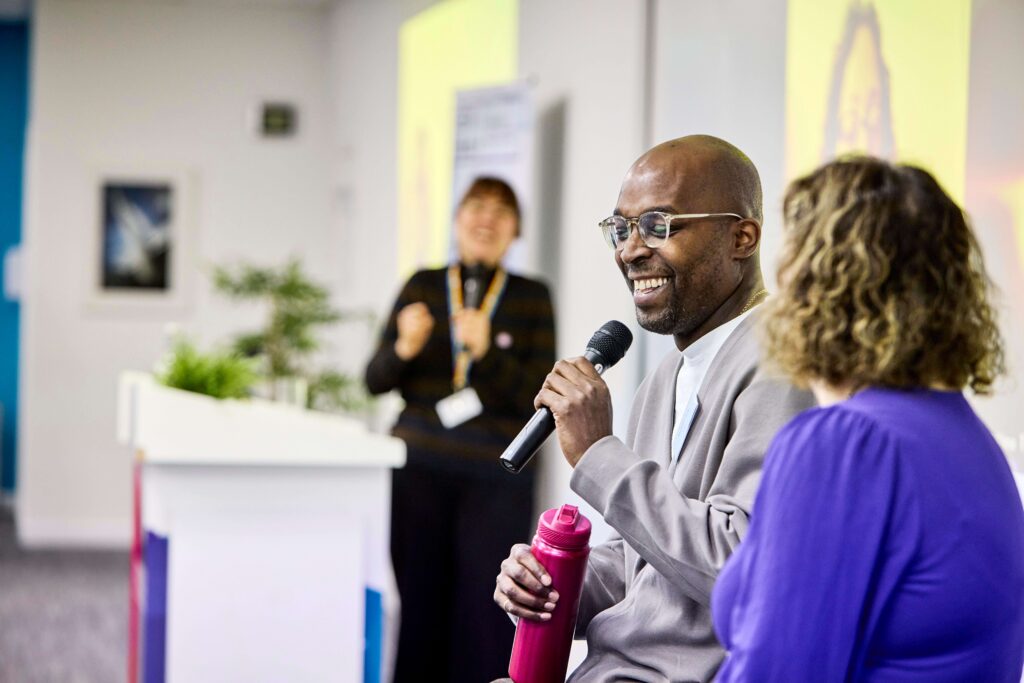 Michael Sulu speaks at the panel session